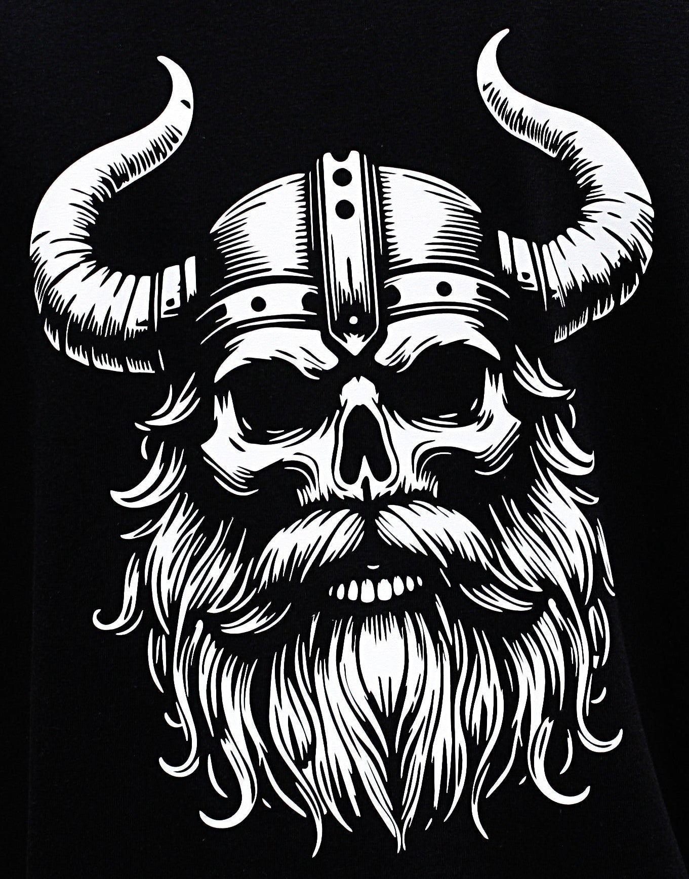 A person wearing a black t-shirt with a reflective Viking helmet design on the back.